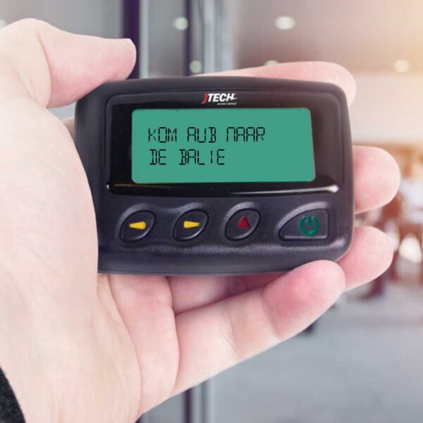 Alpha-Pager-in-hand-tekstmelding